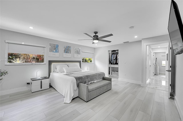 bedroom featuring light wood-style flooring, recessed lighting, and ceiling fan
