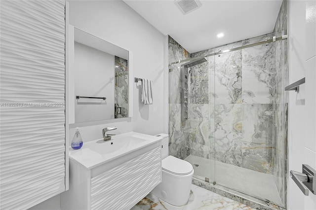 full bathroom with marble finish flooring, a marble finish shower, and vanity