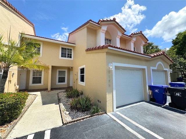 8135 Southgate Blvd, North Lauderdale, FL 33068 - mediterranean / spanish home featuring driveway, stucco siding, and a tile roof