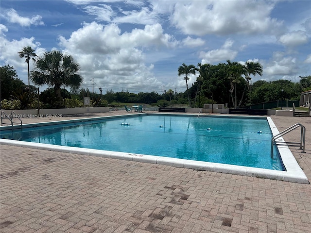 4160 Inverrary Dr Unit 306, Lauderhill, FL 33319 - community pool with a patio area