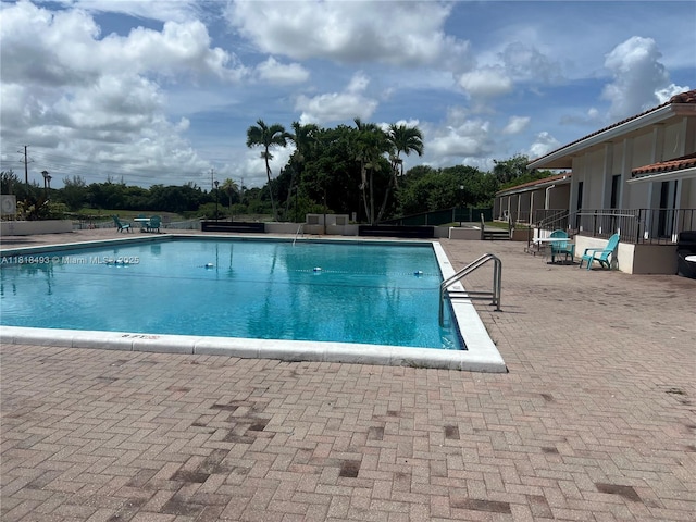 4160 Inverrary Dr Unit 306, Lauderhill, FL 33319 - community pool with a patio