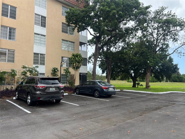 4160 Inverrary Dr Unit 306, Lauderhill, FL 33319 - view of property featuring uncovered parking