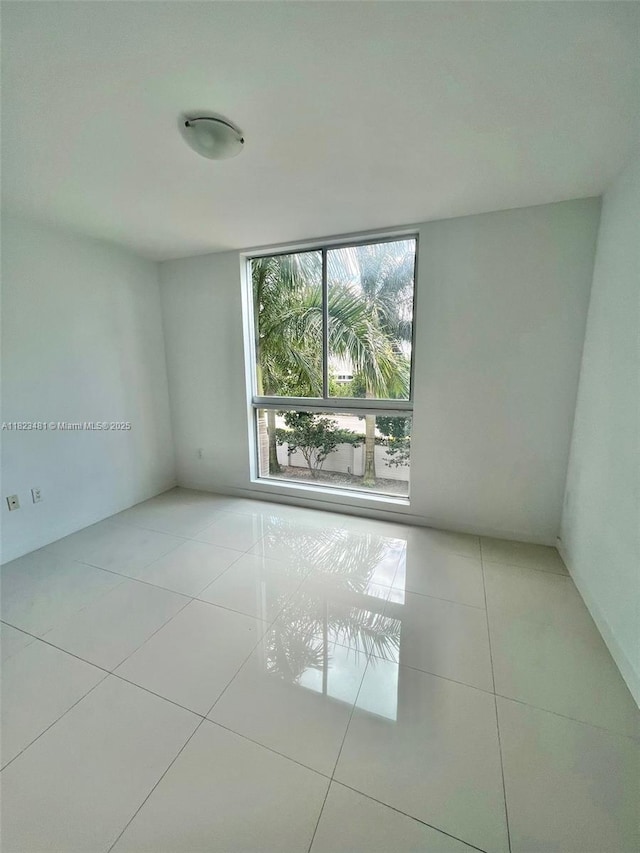 7661 NW 107th Ave Unit 207, Doral, FL 33178 - view of tiled spare room