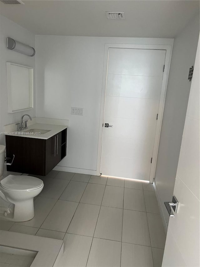 7661 NW 107th Ave Unit 207, Doral, FL 33178 - bathroom with vanity and tile patterned floors