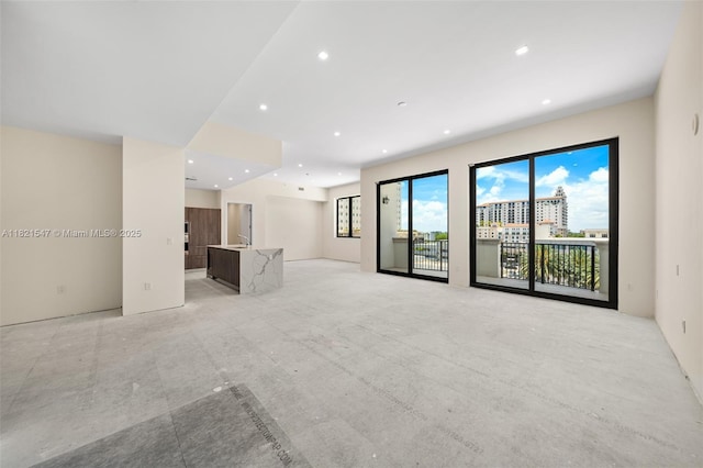275 Giralda Ave Unit 6A-B, Coral Gables, FL 33134 - unfurnished living room with recessed lighting