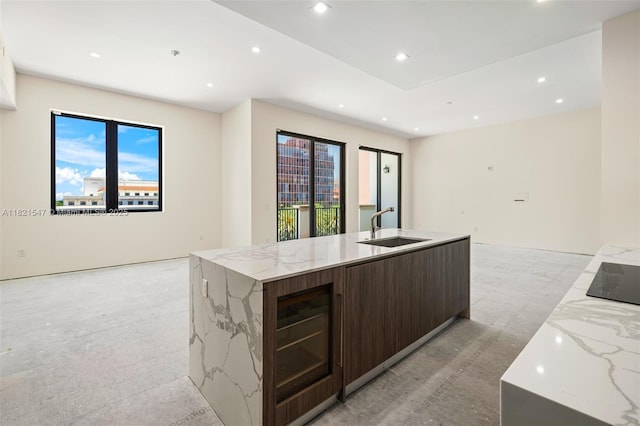 275 Giralda Ave Unit 6A-B, Coral Gables, FL 33134 - kitchen with modern cabinets, open floor plan, recessed lighting, healthy amount of natural light, and dark brown cabinetry