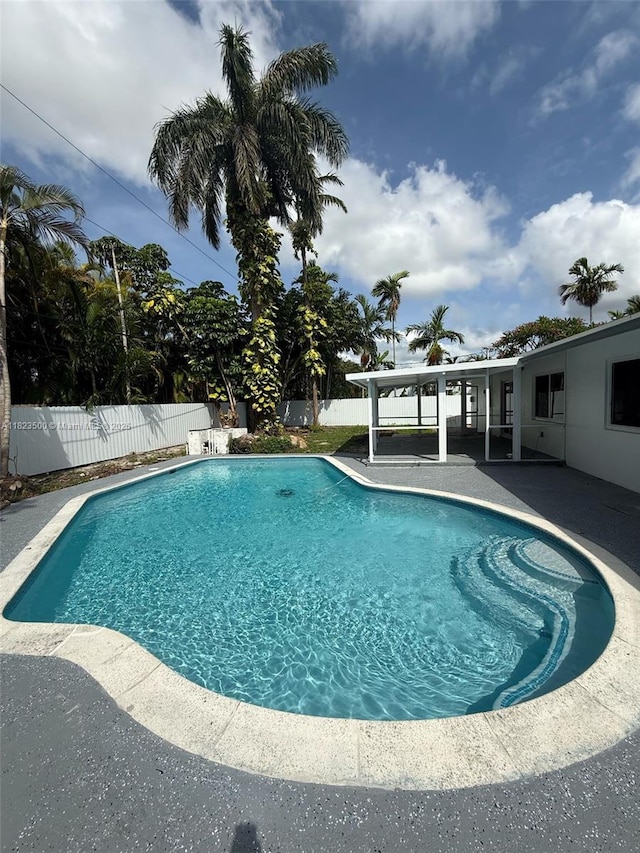 9934 SW 195th St, Cutler Bay, FL 33157 - view of pool featuring a patio and a fenced backyard