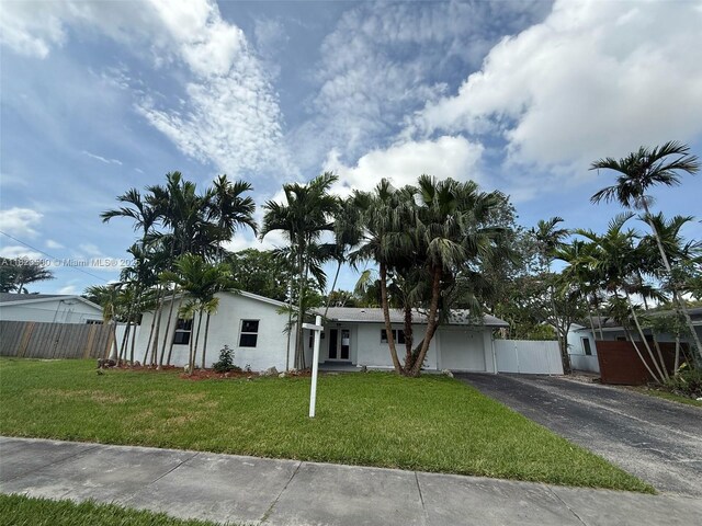 9934 SW 195th St, Cutler Bay, FL 33157 - view of front of home featuring asphalt driveway and stucco siding