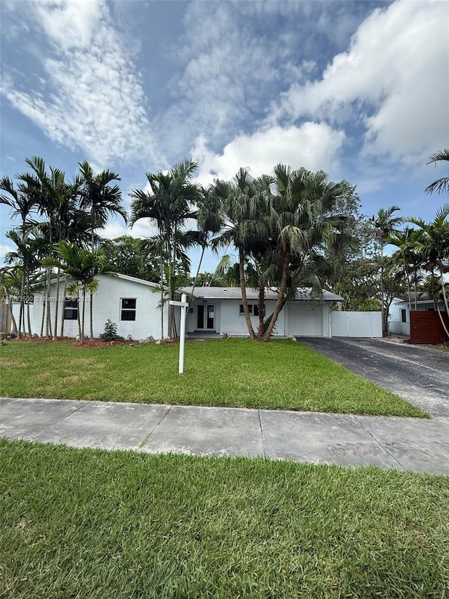 9934 SW 195th St, Cutler Bay, FL 33157 - view of front of home with stucco siding and driveway