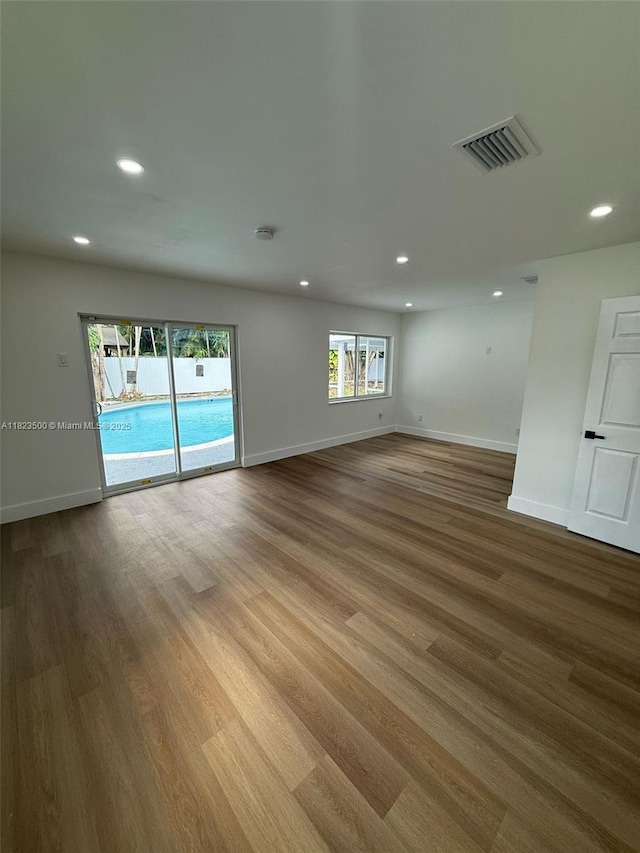 9934 SW 195th St, Cutler Bay, FL 33157 - unfurnished room featuring recessed lighting, wood finished floors, and a smoke detector