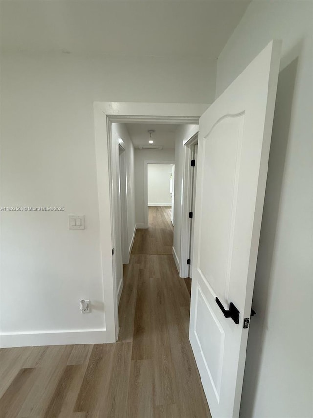9934 SW 195th St, Cutler Bay, FL 33157 - corridor featuring wood finished floors and baseboards