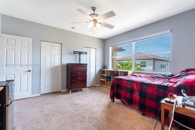 5000 SW 136th Ave, Miramar, FL 33027 - carpeted bedroom with a ceiling fan and two closets