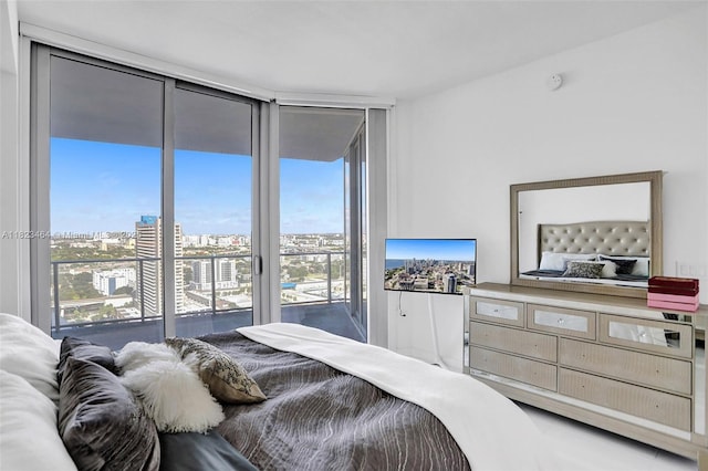 851 NE 1st Ave Unit 2204, Miami, FL 33132 - bedroom with a wall of windows and access to outside