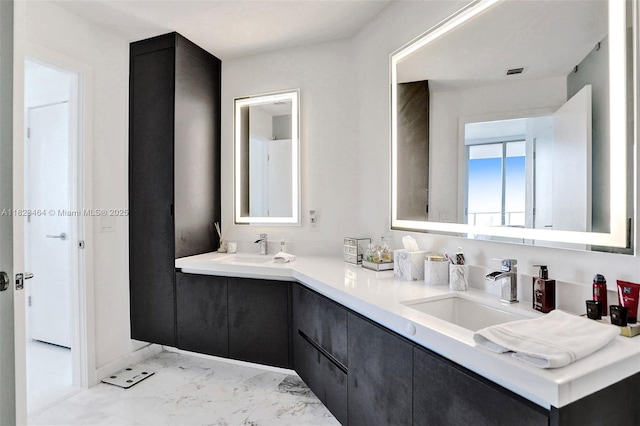 851 NE 1st Ave Unit 2204, Miami, FL 33132 - bathroom with double vanity and marble finish floors