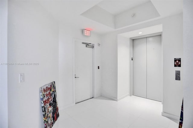 851 NE 1st Ave Unit 2204, Miami, FL 33132 - hallway with elevator and baseboards