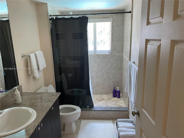 2000 N Bayshore Dr Unit 201, Miami, FL 33137 - full bathroom featuring vanity and a tile shower
