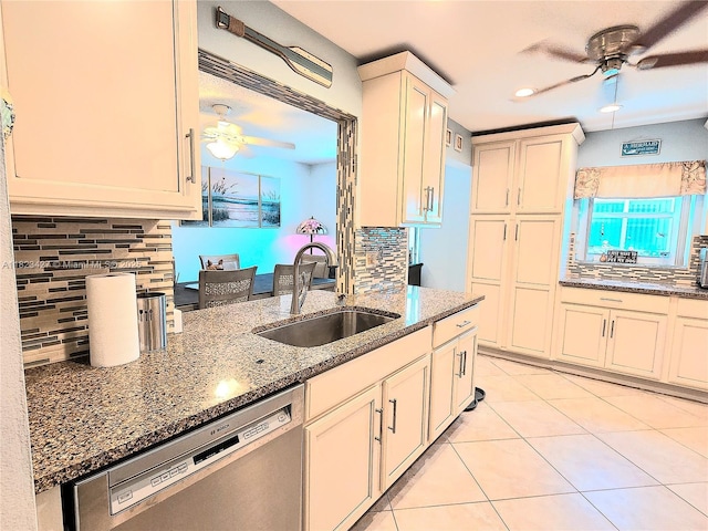 1711 SW 22nd St, Boynton Beach, FL 33426 - kitchen featuring ceiling fan, stainless steel dishwasher, decorative backsplash, dark stone countertops, and recessed lighting