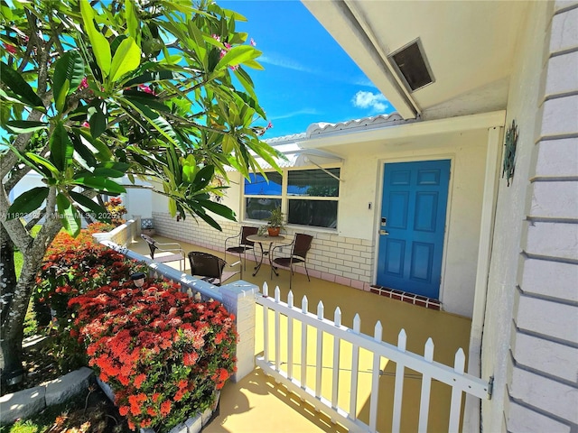 1711 SW 22nd St, Boynton Beach, FL 33426 - entrance to property featuring brick siding and a porch