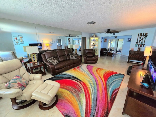 1711 SW 22nd St, Boynton Beach, FL 33426 - living room with ceiling fan and a textured ceiling