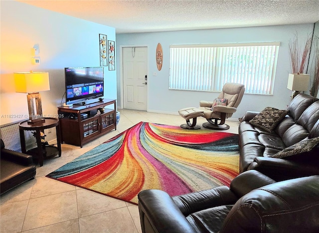 1711 SW 22nd St, Boynton Beach, FL 33426 - living room featuring tile patterned flooring and a textured ceiling