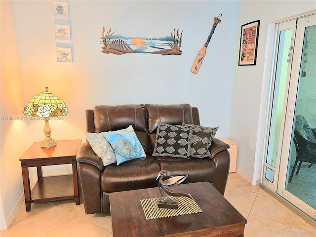 1711 SW 22nd St, Boynton Beach, FL 33426 - living area with light tile patterned floors and baseboards