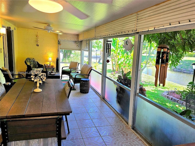 1711 SW 22nd St, Boynton Beach, FL 33426 - sunroom with ceiling fan, tile patterned flooring, and a water view