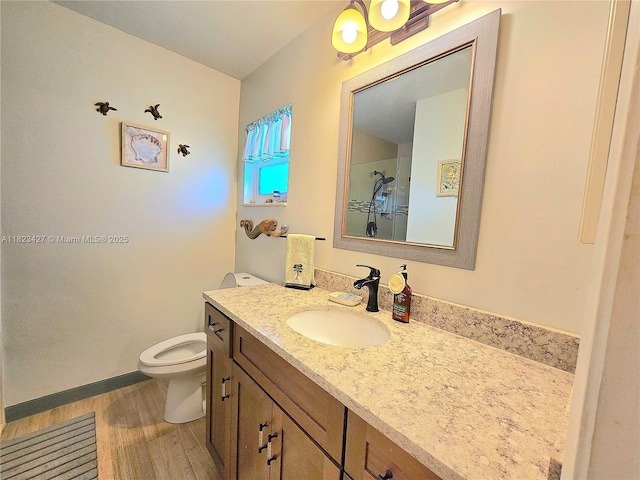 1711 SW 22nd St, Boynton Beach, FL 33426 - full bathroom with wood finished floors, vanity, and a shower