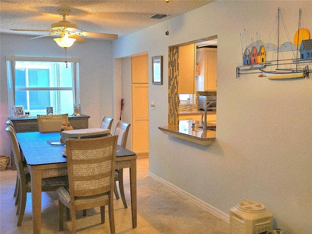 1711 SW 22nd St, Boynton Beach, FL 33426 - dining space with a ceiling fan and light tile patterned floors