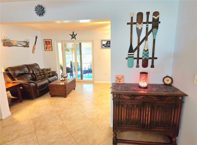 1711 SW 22nd St, Boynton Beach, FL 33426 - living room featuring light tile patterned flooring and baseboards