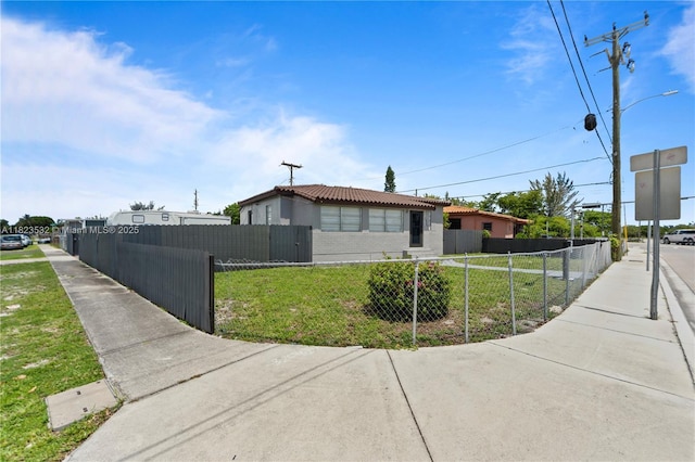 6474 Palm Ave, Hialeah, FL 33012 - view of side of home with a tiled roof