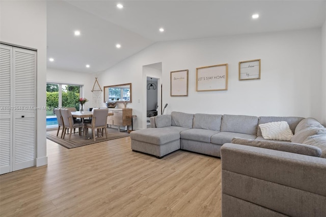 12811 SW 9th Pl, Davie, FL 33325 - living area featuring light wood-type flooring, vaulted ceiling, and recessed lighting