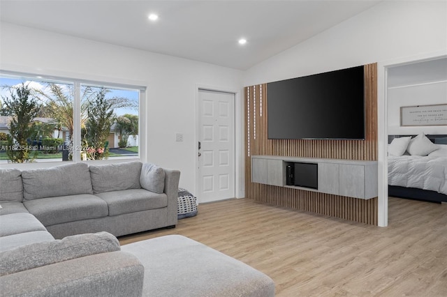 12811 SW 9th Pl, Davie, FL 33325 - living room with light wood-style floors, recessed lighting, and lofted ceiling