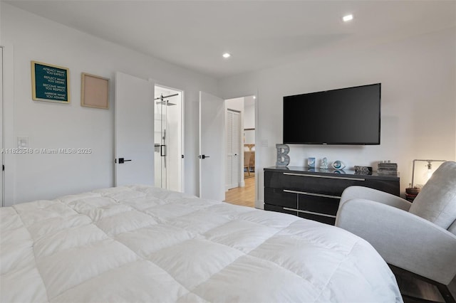 12811 SW 9th Pl, Davie, FL 33325 - bedroom with recessed lighting and light wood-style flooring
