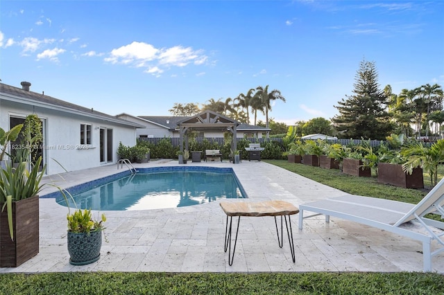 12811 SW 9th Pl, Davie, FL 33325 - view of swimming pool with a patio area, a gazebo, and a fenced backyard
