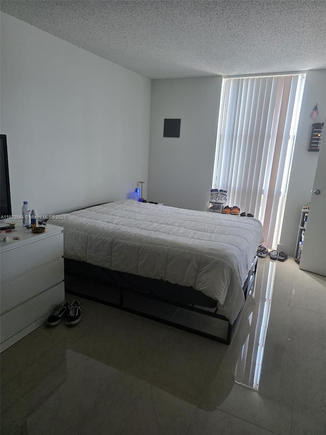 13499 Biscayne Blvd Unit 1005, North Miami, FL 33181 - bedroom with a textured ceiling