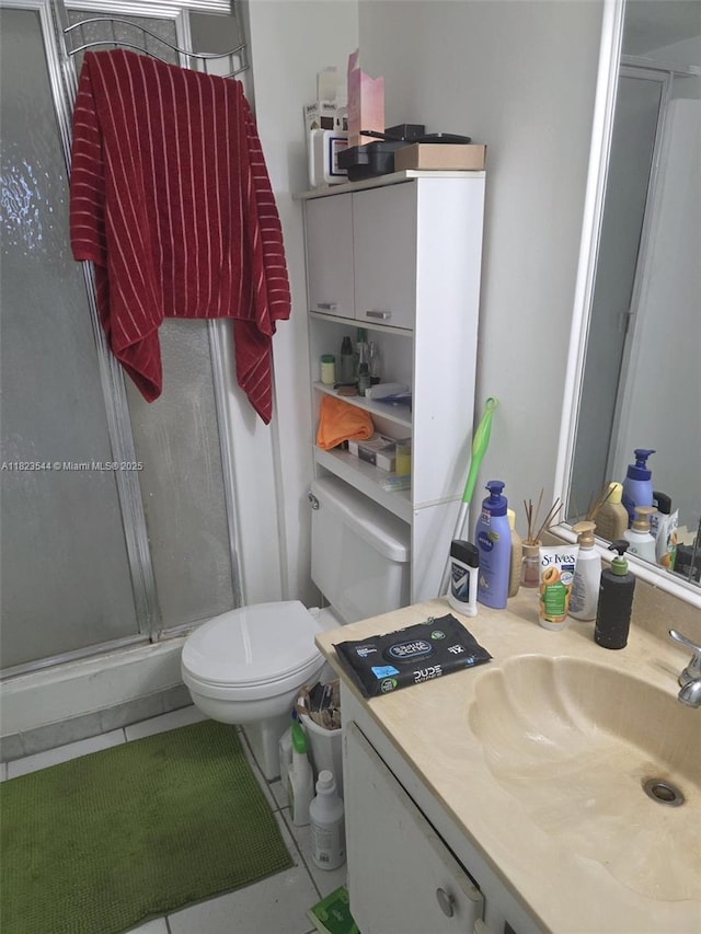 13499 Biscayne Blvd Unit 1005, North Miami, FL 33181 - bathroom featuring a shower stall, vanity, and tile patterned flooring
