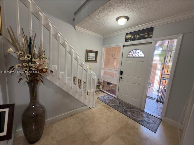 1651 SW 120th Ave, Pembroke Pines, FL 33025 - tiled entrance foyer featuring stairway, a textured ceiling, and ornamental molding