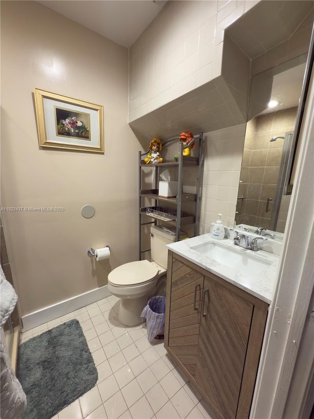 1651 SW 120th Ave, Pembroke Pines, FL 33025 - bathroom featuring tile patterned flooring, vanity, and tile walls