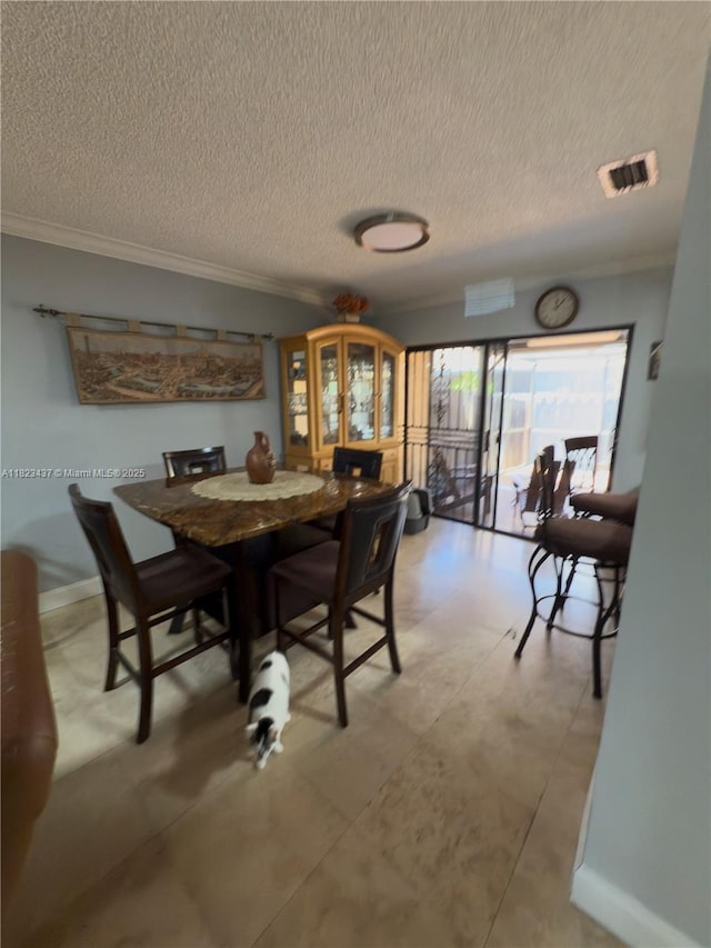 1651 SW 120th Ave, Pembroke Pines, FL 33025 - dining space with a textured ceiling and crown molding