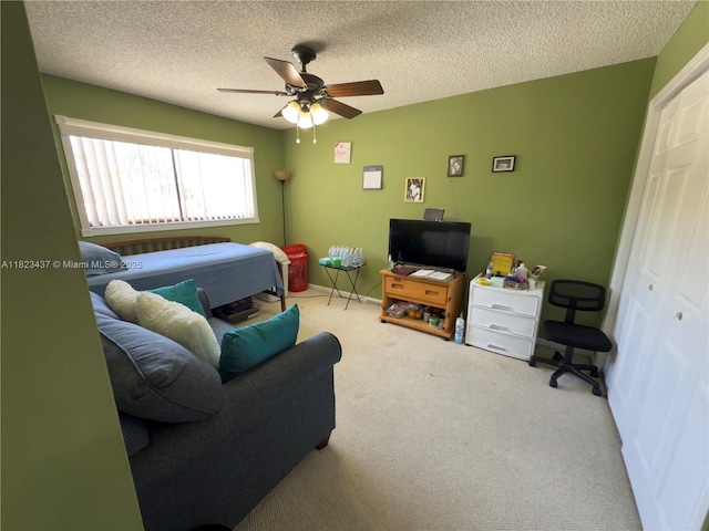 1651 SW 120th Ave, Pembroke Pines, FL 33025 - bedroom with carpet floors, a textured ceiling, and a ceiling fan