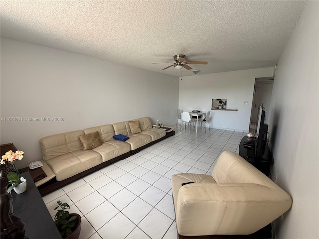5705 W 20th Ave Unit 310, Hialeah, FL 33012 - living area with ceiling fan, light tile patterned floors, and a textured ceiling