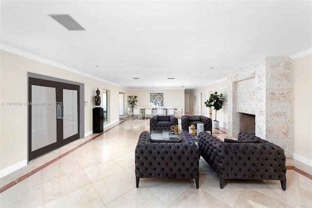 13454 SW 58th Ave, Pinecrest, FL 33156 - living area featuring ornamental molding, light tile patterned floors, and a tiled fireplace