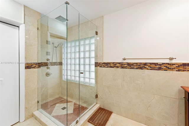 13454 SW 58th Ave, Pinecrest, FL 33156 - bathroom featuring a shower stall, tile walls, and vanity