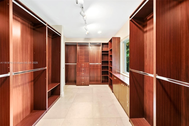 13454 SW 58th Ave, Pinecrest, FL 33156 - walk in closet with light tile patterned floors