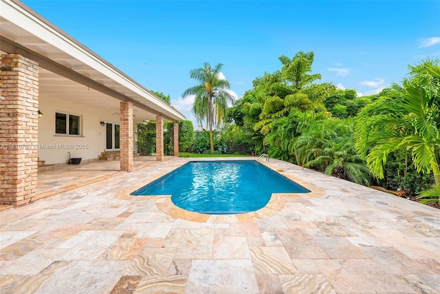 13454 SW 58th Ave, Pinecrest, FL 33156 - outdoor pool with a patio