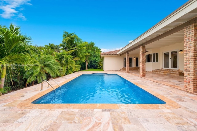 13454 SW 58th Ave, Pinecrest, FL 33156 - swimming pool with french doors, a patio area, and ceiling fan