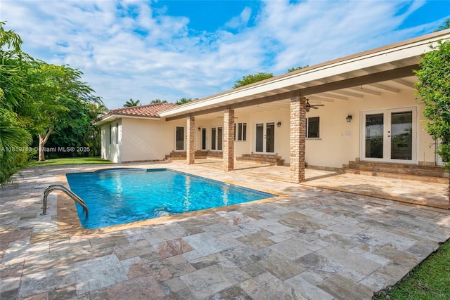 13454 SW 58th Ave, Pinecrest, FL 33156 - outdoor pool featuring french doors, entry steps, a patio area, and a ceiling fan