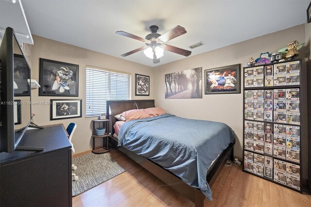 490 Talavera Rd, Weston, FL 33326 - bedroom with wood finished floors and ceiling fan