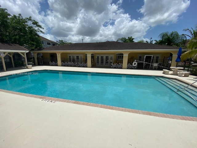 15422 SW 284th St Unit 7207, Homestead, FL 33033 - community pool featuring french doors, a gazebo, and a patio