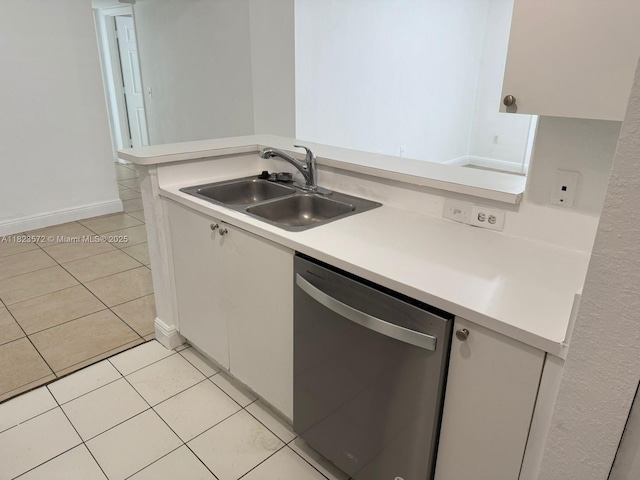 15422 SW 284th St Unit 7207, Homestead, FL 33033 - kitchen featuring stainless steel dishwasher, light tile patterned floors, and light countertops